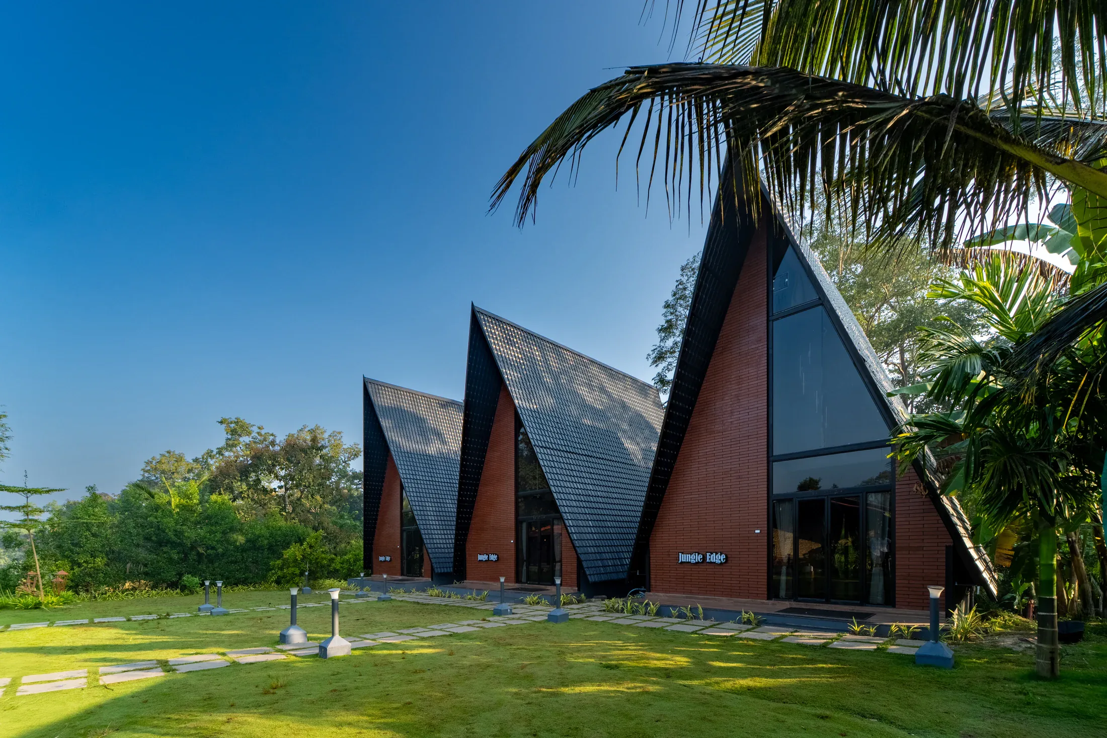 The A-frame cottages and gardens at Jungle Edge Resort